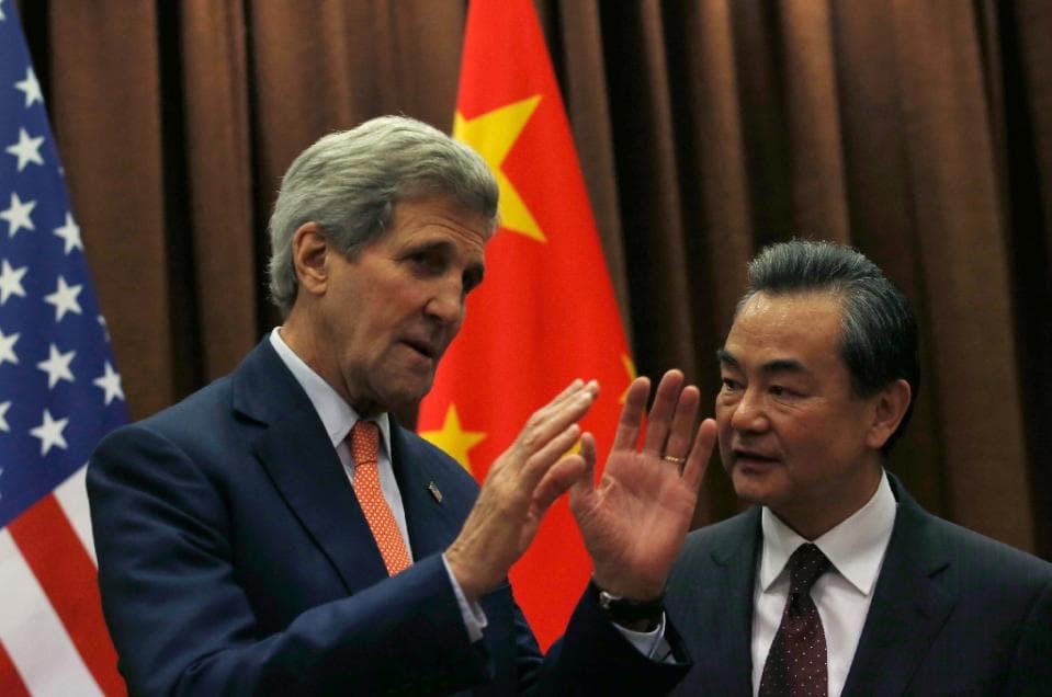 Johnas Kerry ir Wang Yi